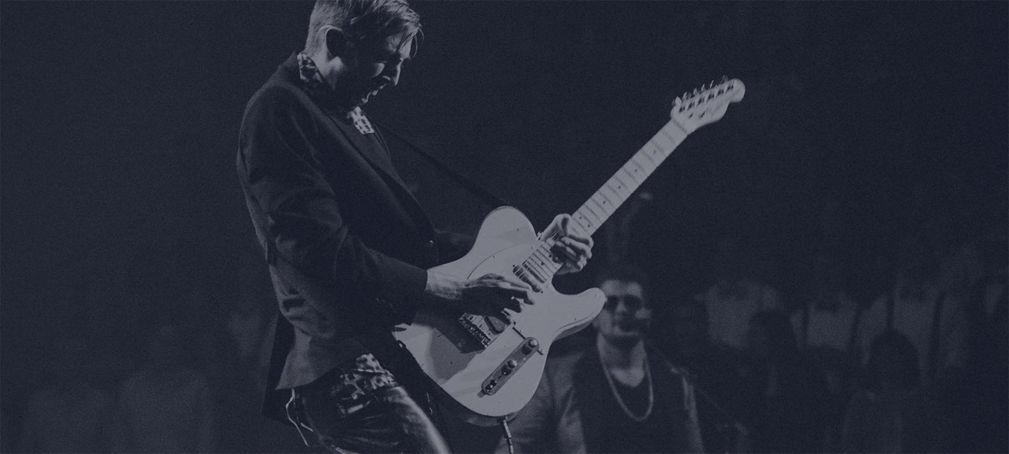 Person Playing Guitar